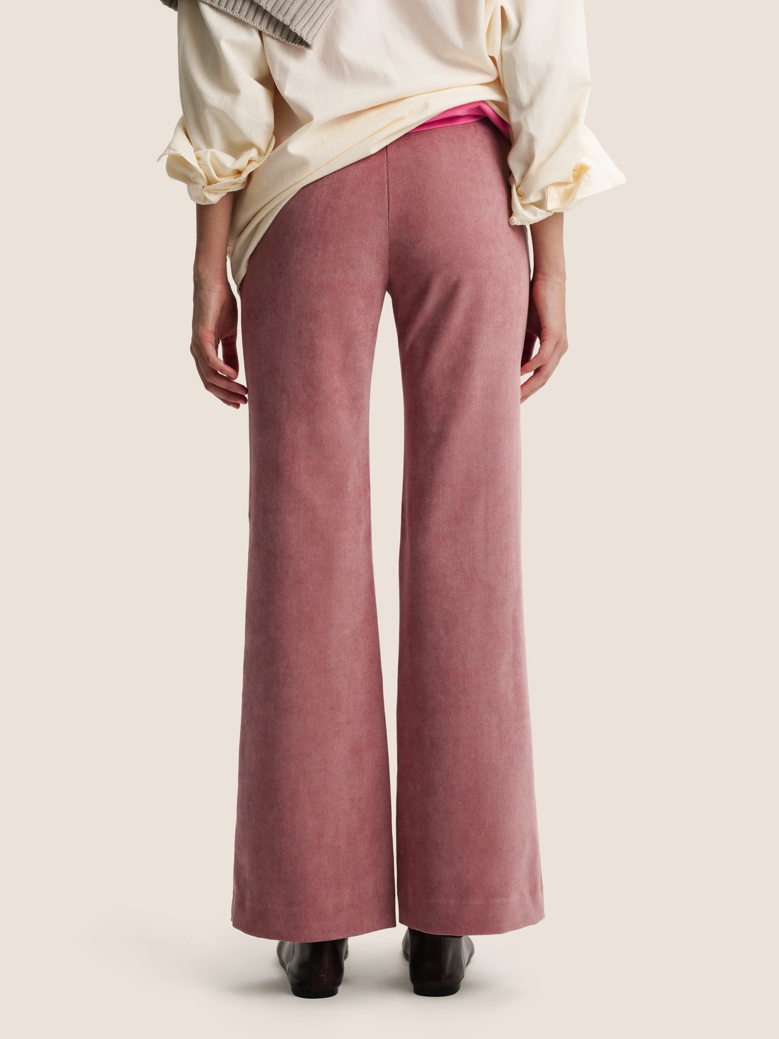 PINK FLARED TROUSERS