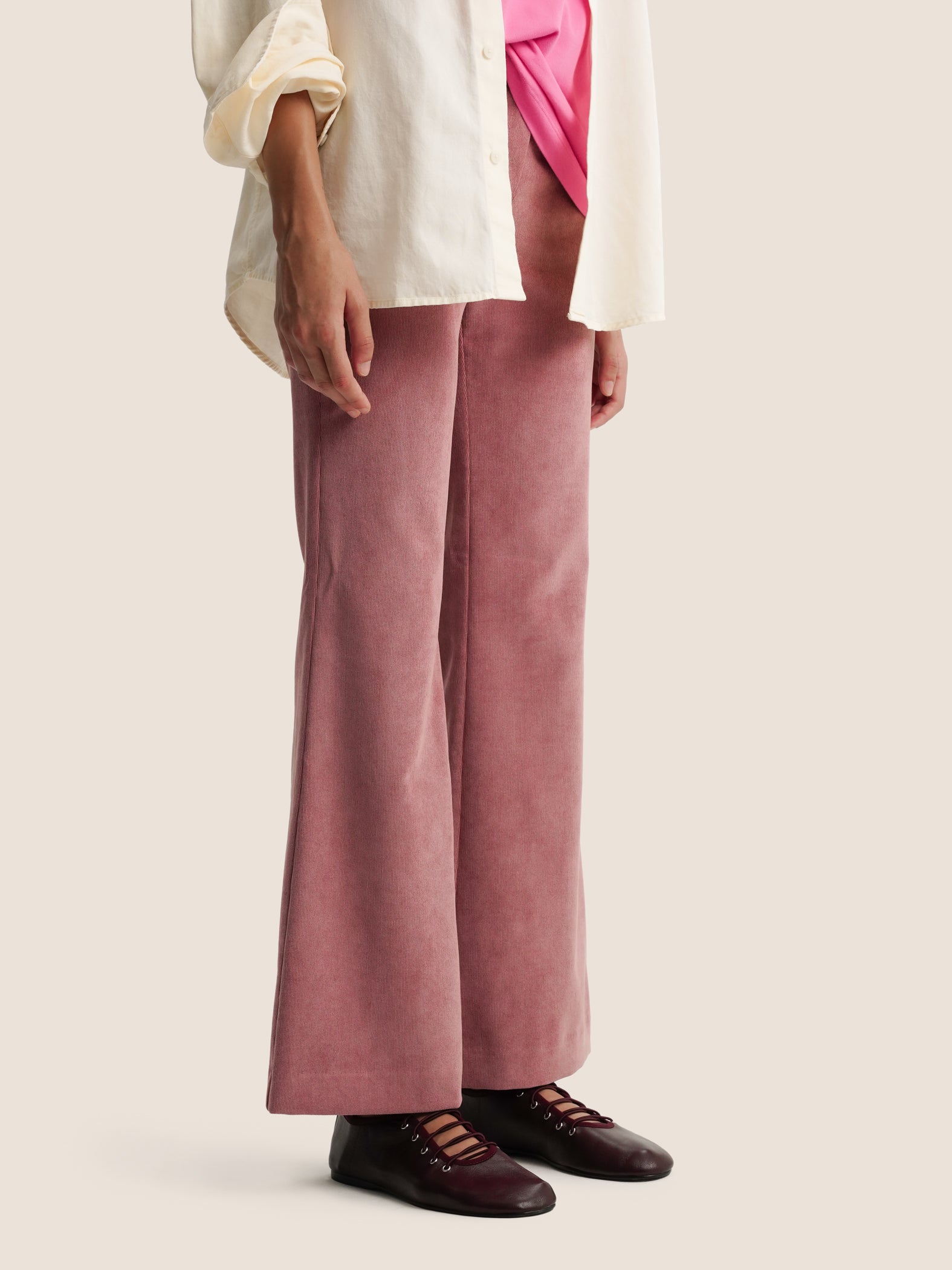 PINK FLARED TROUSERS