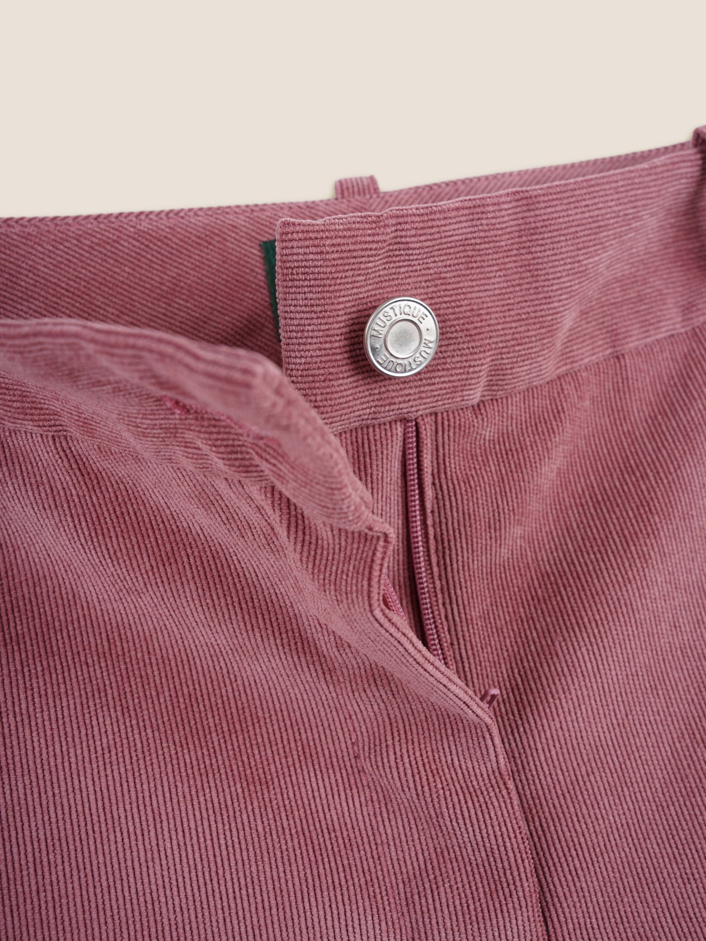 PINK FLARED TROUSERS