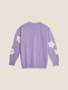 Lilac knitted sweater adorned with daisies.