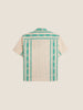 A green folklore short sleeve shirt made from a cotton and linen blend.