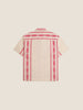 A white and red striped short-sleeved shirt made from a fabric with a touch of folklore charm.
