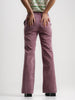 Lilac flared corduroy trousers with a retro vibe.